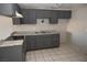 This kitchen features granite countertops and tile flooring at 3101 E Carey Ave, North Las Vegas, NV 89030