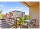 Balcony seating area with sunny views of the community at 3159 Via Como, Henderson, NV 89044