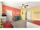 Colorful bedroom boasts a ceiling fan, ample natural light, and a cheerful atmosphere at 3159 Via Como, Henderson, NV 89044
