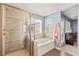 Main bathroom with walk-in shower and soaking tub at 3159 Via Como, Henderson, NV 89044