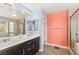 Main bathroom with double sink vanity, shower and soaker tub at 3159 Via Como, Henderson, NV 89044