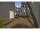 Spacious backyard with shade trees offering privacy and comfort at 3481 Creek River Dr, Las Vegas, NV 89129