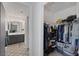 Walk-in closet, providing lots of storage space for clothing and shoes at 3481 Creek River Dr, Las Vegas, NV 89129