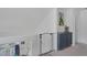 Upstairs hallway with a baby gate and a view overlooking downstairs at 3481 Creek River Dr, Las Vegas, NV 89129