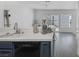 Practical kitchen with adjacent breakfast nook and access to outdoor patio area at 3481 Creek River Dr, Las Vegas, NV 89129