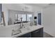 Kitchen with breakfast bar overlooking the dining area and outdoor views at 3481 Creek River Dr, Las Vegas, NV 89129