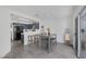 Eat-in kitchen features stainless appliances, breakfast bar and sliding doors to patio at 3481 Creek River Dr, Las Vegas, NV 89129
