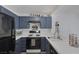 Well-equipped kitchen featuring stainless appliances and plenty of cabinet space at 3481 Creek River Dr, Las Vegas, NV 89129