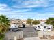 RV parking lot featuring secure gated entry and mountain views at 3481 Creek River Dr, Las Vegas, NV 89129