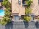 Overhead view of a residential home with a tile roof, private backyard, and attached garage at 3481 Creek River Dr, Las Vegas, NV 89129