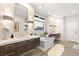 Luxurious bathroom features double sinks, a standalone tub, and elegant finishes at 358 Solitude Peak Ln, Henderson, NV 89012