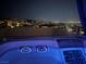 Rooftop hot tub with city views at night at 358 Solitude Peak Ln, Henderson, NV 89012