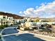 Community street view showing modern homes, neat landscaping, and a well-maintained neighborhood at 358 Solitude Peak Ln, Henderson, NV 89012