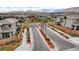 Gated community entrance with landscaped grounds and palm trees enhancing curb appeal at 4160 Elegant Chateau St, Las Vegas, NV 89135