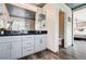 Tastefully designed bathroom featuring a double sink vanity, modern fixtures and a neutral color palette at 4308 Desert Haven Ave, North Las Vegas, NV 89085