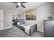 Charming bedroom with a mirrored closet, soft rug and neutral décor for a relaxing space at 4308 Desert Haven Ave, North Las Vegas, NV 89085