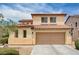 Charming two-story home featuring a two-car garage and well-maintained landscaping at 4308 Desert Haven Ave, North Las Vegas, NV 89085