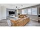 Inviting living room featuring ample natural light, new floors and neutral tones at 4308 Desert Haven Ave, North Las Vegas, NV 89085