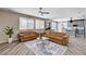 Inviting living room featuring ample natural light, new floors and open floorplan at 4308 Desert Haven Ave, North Las Vegas, NV 89085