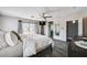 Bright main bedroom with balcony access, scenic mountain views, and unique ladder storage at 4308 Desert Haven Ave, North Las Vegas, NV 89085