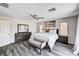 Bright and modern main bedroom with view of the beach, large closet, and en suite bathroom at 4308 Desert Haven Ave, North Las Vegas, NV 89085