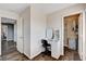 Well-lit vanity area with ample storage and an adjacent closet providing convenient space and organization at 4308 Desert Haven Ave, North Las Vegas, NV 89085