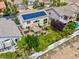 Aerial view of home with solar panels, spacious backyard with a patio, mature landscaping, and inviting outdoor area at 4326 Spooner Lake Cir, Las Vegas, NV 89147
