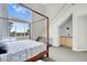 Bright bedroom with large windows providing plenty of natural light and a view to the backyard at 4326 Spooner Lake Cir, Las Vegas, NV 89147