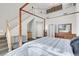 Sun-filled bedroom with lofted ceiling and a view of the stairs at 4326 Spooner Lake Cir, Las Vegas, NV 89147