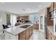Spacious kitchen with a center island, stainless steel appliances, and a dine-in table at 4326 Spooner Lake Cir, Las Vegas, NV 89147