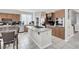 Bright, eat-in kitchen features center island with stainless steel appliances, and ample countertop space at 4326 Spooner Lake Cir, Las Vegas, NV 89147