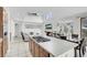 Large kitchen featuring a spacious island, modern appliances, and adjacent living area at 4326 Spooner Lake Cir, Las Vegas, NV 89147