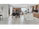 Open kitchen with a center island, stainless appliances, and an adjacent dining area at 4326 Spooner Lake Cir, Las Vegas, NV 89147