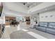 Open-concept living area with a kitchen, dining area, and living room, perfect for entertaining at 4326 Spooner Lake Cir, Las Vegas, NV 89147