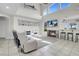 Bright living area with high ceilings, fireplace, bar seating and lots of natural light at 4326 Spooner Lake Cir, Las Vegas, NV 89147