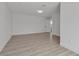 A bright bedroom featuring light wood flooring and a neutral color palette at 4404 Hillcrest Ave, Las Vegas, NV 89102