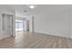 Serene bedroom with laminate floors, ample natural light, fresh paint and a sliding glass door to the outside at 4404 Hillcrest Ave, Las Vegas, NV 89102