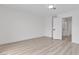 A bedroom with recessed lighting and wood look flooring at 4404 Hillcrest Ave, Las Vegas, NV 89102