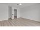 A bedroom with recessed lighting and wood look flooring at 4404 Hillcrest Ave, Las Vegas, NV 89102
