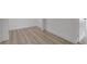 A modern hallway featuring light wood flooring at 4404 Hillcrest Ave, Las Vegas, NV 89102