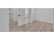 A modern hallway that opens to the bathroom at 4404 Hillcrest Ave, Las Vegas, NV 89102