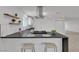 Open kitchen featuring an island with seating, perfect for casual dining and entertaining at 4404 Hillcrest Ave, Las Vegas, NV 89102