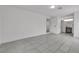 Bright living room with tile flooring, and open access to the bathroom at 4404 Hillcrest Ave, Las Vegas, NV 89102