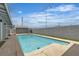 Private backyard features a refreshing in-ground swimming pool and concrete patio at 4404 Hillcrest Ave, Las Vegas, NV 89102