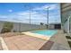 Inviting backyard features an in-ground swimming pool and brick-paver patio at 4404 Hillcrest Ave, Las Vegas, NV 89102