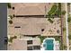 Bird's eye view showcases backyard amenities including putting greens and a pool, set in an exclusive residential setting at 465 Cabral Peak St, Las Vegas, NV 89138