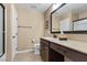 A well-lit bathroom features a modern vanity, tile floors, and clean fixtures, providing a serene atmosphere at 465 Cabral Peak St, Las Vegas, NV 89138