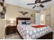 A patriotic bedroom features a comfortable bed, ceiling fan, and coordinated decor for a cozy feel at 465 Cabral Peak St, Las Vegas, NV 89138