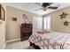 A cozy bedroom features a star themed decor, neutral walls, and a comfortable bed with patriotic quilt at 465 Cabral Peak St, Las Vegas, NV 89138