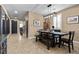 Bright dining room with wooden table, natural light, and neutral paint at 465 Cabral Peak St, Las Vegas, NV 89138